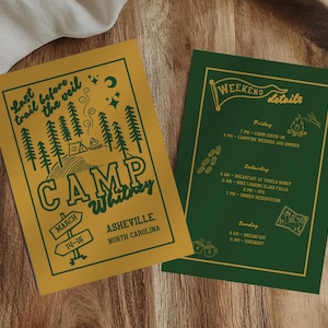 May include: A yellow and green illustrated poster for Camp Whitney in Asheville, North Carolina. The poster features a stylised illustration of a forest with a tent and the text "Last trail before the veil". The poster also includes the text "Camp Whitney", "March 14-16", and "Asheville, North Carolina".