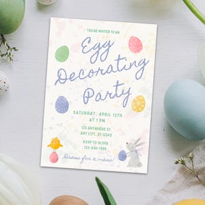 May include: A pastel-colored invitation to an egg decorating party. The invitation features a watercolor background with colorful eggs and a bunny and chick illustration. The text reads "You're invited to an Egg Decorating Party" and includes the date, time, location, and RSVP information.