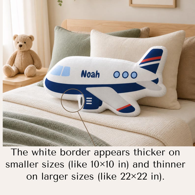 May include: A white airplane-shaped pillow with blue and red accents, the word "Noah" is printed on the side. The pillow is on a bed with a teddy bear in the background. The white border appears thicker on smaller sizes (like 10x10 in) and thinner on larger sizes (like 22x22 in).