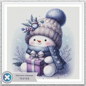 May include: Watercolor illustration of a snowman wearing a blue knit hat with a pom-pom, a matching scarf, and holding a purple gift box. The snowman has rosy cheeks and is decorated with a small bird and berries.
