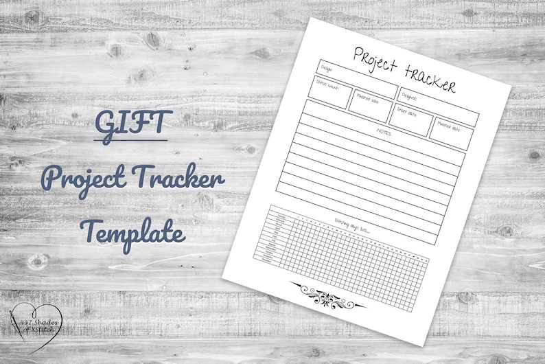 May include: A white Project Tracker Template on a light wood grain surface. The template includes sections for project details, notes, and a habit tracker. The words "GIFT Project Tracker Template" are written in a script font.