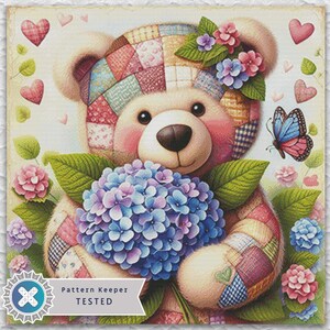 May include: A charming illustration of a teddy bear clutching a bouquet of blue and purple hydrangeas. The bear features a patchwork design and floral embellishments. A butterfly and hearts enhance the vintage aesthetic. The text "Pattern Keeper TESTED" is visible.