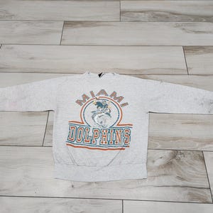 Sudadera vintage de cuello redondo gris de los Miami Dolphins para hombre talla L dañada