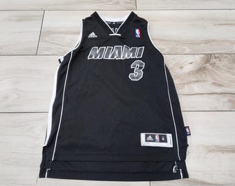 ドウェイン・ウェイド直筆サイン入りマイアミ・ヒートジャージ（COA