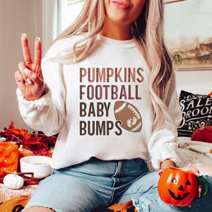 Football Baby Bumps Pregnancy Announcement Sweatshirt Fall Maternity Sweater Football Baby Reveal Hoodie Thanksgiving Maternity Sweat Shirt