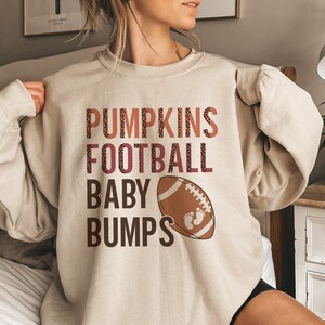 Football Baby Bumps Pregnancy Announcement Sweatshirt Fall Maternity Sweater Football Baby Reveal Hoodie Thanksgiving Maternity Sweat Shirt