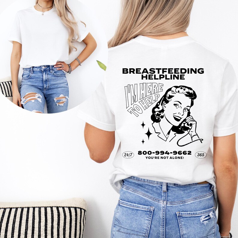 May include: White t-shirt with a black and white illustration of a woman on the phone. The text "Breastfeeding Helpline I'm Here To Help 800-994-9662 You're Not Alone!" is printed on the shirt.