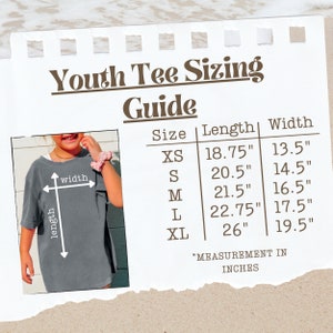 May include: A chart showing youth tee sizing guide with measurements in inches. The chart shows sizes XS, S, M, L, and XL with corresponding length and width measurements.