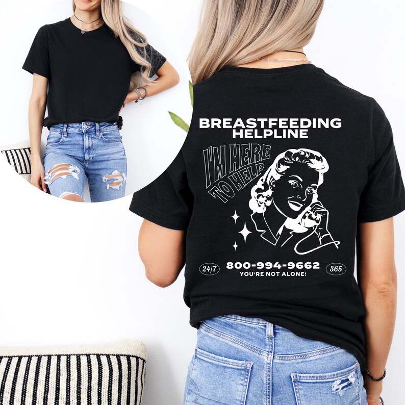 May include: Black t-shirt with a white graphic of a woman on the phone with the text "Breastfeeding Helpline I'm Here To Help 800-994-9662 You're Not Alone!"  24/7 365