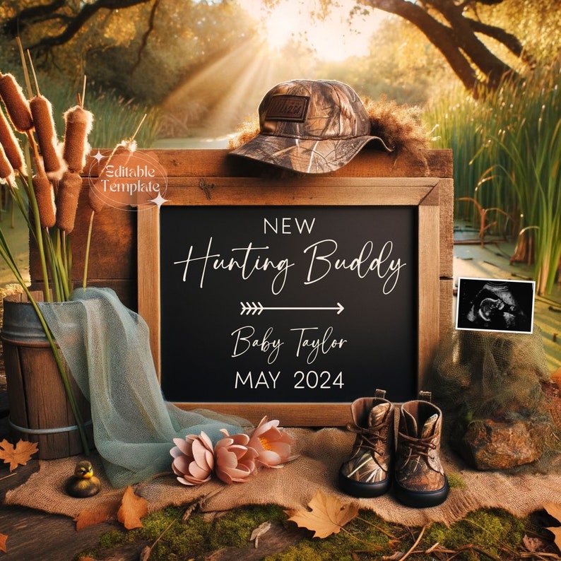 May include: A chalkboard sign with the text "New Hunting Buddy" and "Baby Taylor May 2024". A camouflage hat, baby boots, and an ultrasound image are also in the photo.
