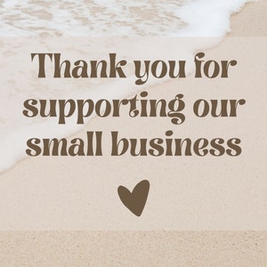 May include: A brown text graphic on a sandy beach background with white foamy waves. The text reads "Thank you for supporting our small business" with a brown heart below the text.