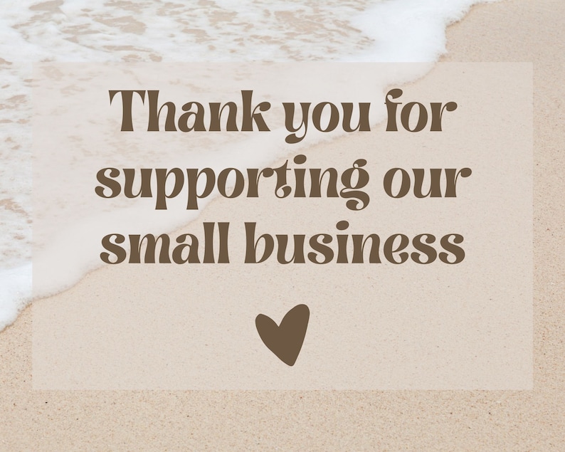 May include: A brown text graphic on a sandy beach background with white foamy waves. The text reads "Thank you for supporting our small business" with a brown heart below the text.