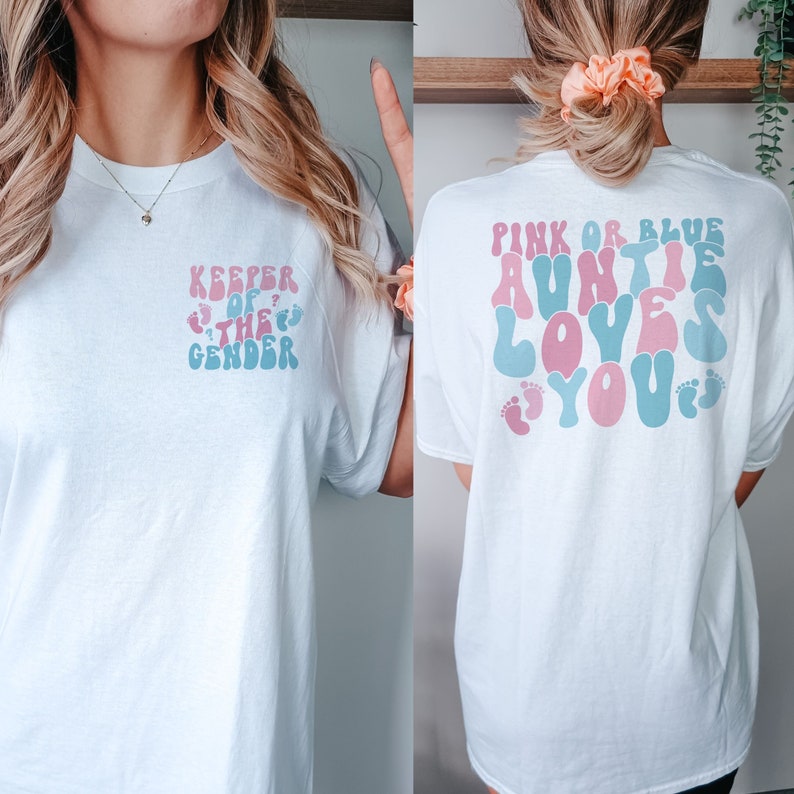 women wearing keeper of the gender shirt that says "pink or blue auntie loves you" on the back and "keeper of the gender" on the front pocket of theshirt.