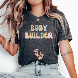 Camiseta con anuncio de embarazo de culturista, camiseta reveladora de entrenamiento físico, atuendo de anuncio de bebé de levantamiento de pesas, regalo de maternidad para compañero de gimnasio