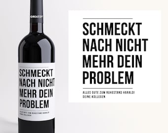 May include: A bottle of red wine with a white label that reads "Schmeckt nach nicht mehr dein Problem. Alles gute zum Ruhestand Harald! Deine Kollegen."