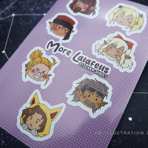 May include: A sticker sheet with the text "More Lalafeils Sticker Sheet" and illustrations of cartoon characters with different expressions. The characters are all wearing different outfits and accessories. The background is a light purple with white polka dots.