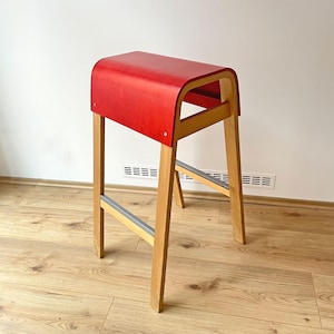 May include: A set of three ceramic mugs with a speckled, matte finish. The mugs are in shades of cream, light gray, and dark gray. Each mug has a simple, minimalist design, perfect for coffee or tea.