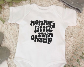 Body de bebé Mommy's Swim Champ: mono de algodón para bebé
