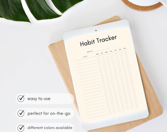 May include: A digital tablet displaying a printable habit tracker with a cream background. The tracker has a section for the week of the month, a column for the habit, and columns for each day of the week. The tablet is on top of a brown notebook. The text on the tablet reads "Habit Tracker".