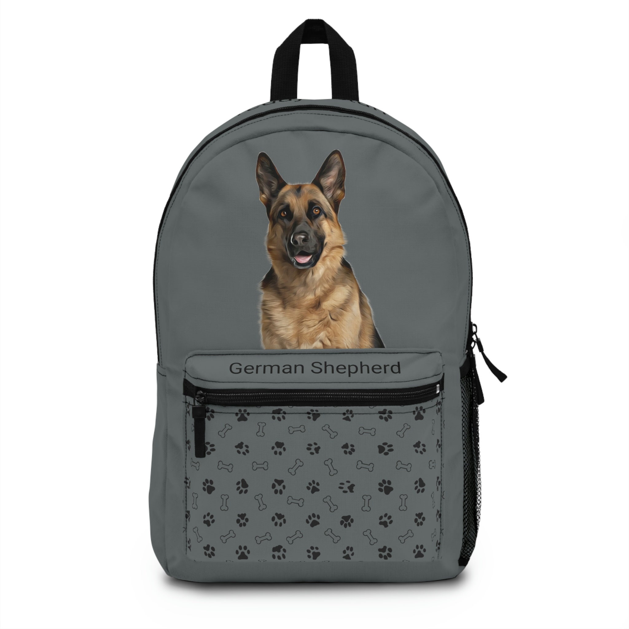german shepherd in backpack