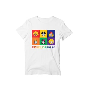 May include: White t-shirt with a rainbow-colored square design featuring pixelated images of six drag queens. The text "PIXELDRAGS®" is printed below the design.
