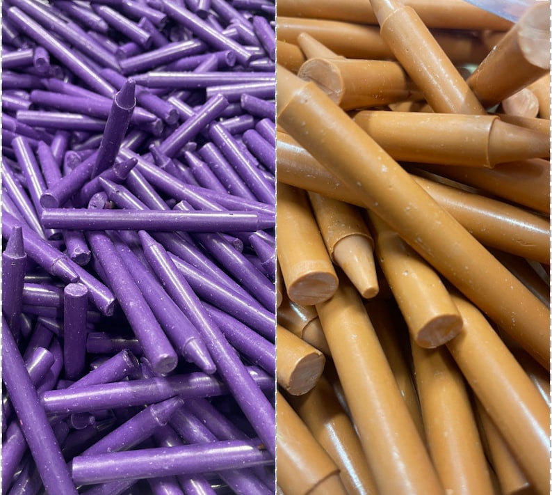 May include: Two bundles of crayons, one purple and one brown. The purple crayons are arranged in a random pattern, while the brown crayons are arranged in a more organized pattern.