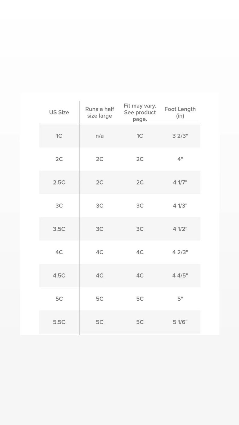 May include: A chart showing UK shoe sizes for children, with corresponding foot lengths in inches. The chart also indicates that the shoe size runs a half size large.