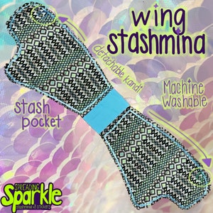 May include: A black and white patterned stash pocket with a turquoise accent and the words "wing stashmina" in purple. The text "detachable kandi" and "Machine Washable" are also visible.