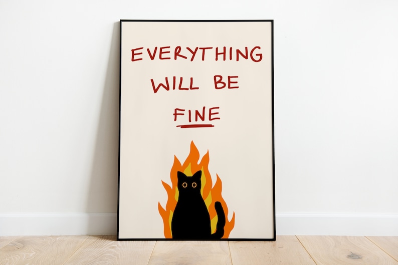 May include: A black cat sits in a fire with the text "EVERYTHING WILL BE FINE" above it. The cat has yellow eyes and a black tail. The fire is orange and yellow.
