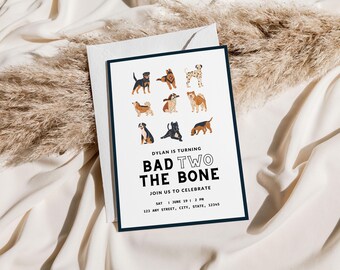 May include: A white card with a black border and illustrations of dogs. The text reads "Dylan is turning Bad Two The Bone. Join us to celebrate Sat June 19 1 2 PM 123 Any Street, City, State, 12345"