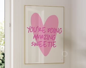 May include: Pink heart-shaped graphic with the text "You're doing amazing sweetie" on a white background with a gold frame.