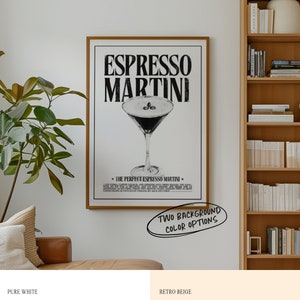 May include: A black and white poster with the text "Espresso Martini" in bold letters. The poster features a martini glass filled with a dark liquid and coffee beans. The text "The Perfect Espresso Martini" is below the image. The poster is framed in wood and is hanging on a white wall.