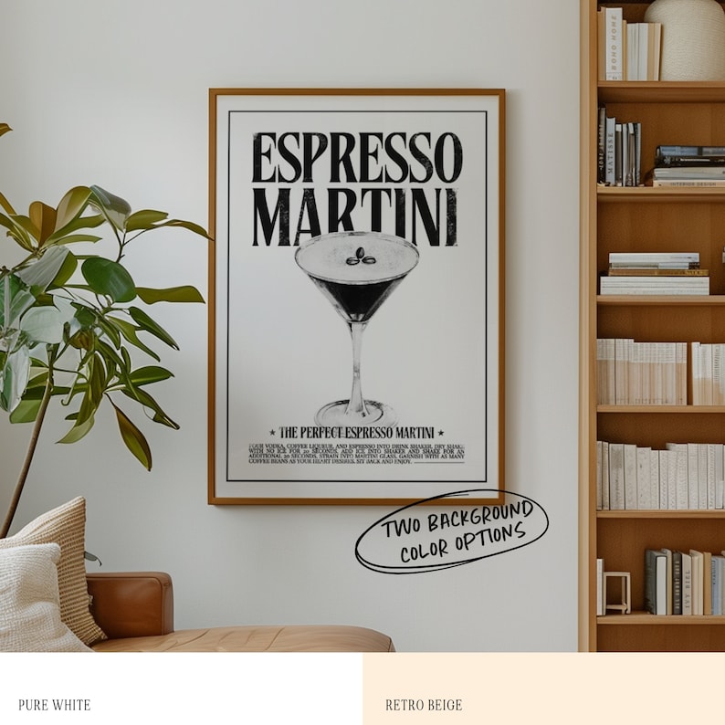 May include: A black and white poster with the text "Espresso Martini" in bold letters. The poster features a martini glass filled with a dark liquid and coffee beans. The text "The Perfect Espresso Martini" is below the image. The poster is framed in wood and is hanging on a white wall.