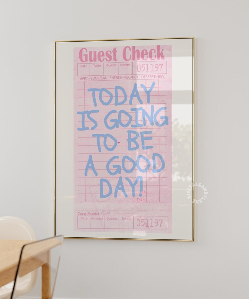 May include: A pink and white guest check with the text "TODAY IS GOING TO BE A GOOD DAY!" written in blue. The check has a date of 051197.
