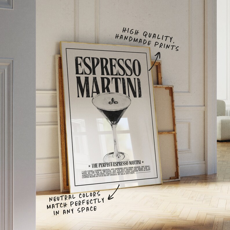 May include: A black and white poster with a gold frame featuring a martini glass with coffee beans and the text "Espresso Martini" and "The Perfect Espresso Martini". The poster has a white background and the text is in a bold, sans-serif font.
