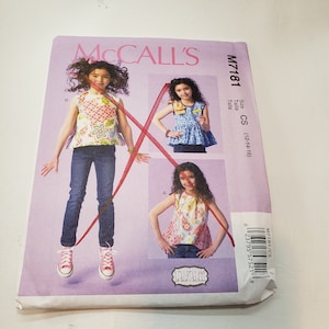 McCalls 7181 | Girls Tops Sewing Pattern, Sizes  12-16, Girls Sleeveless Ruffled Handkerchief or Flounced/Ruffled Top FF UNCUT