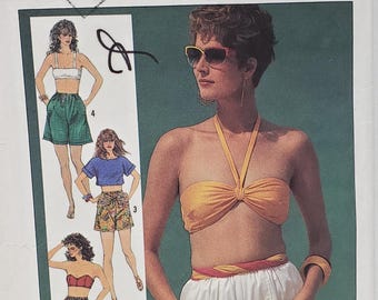 Patrón de costura Simplicity 7519 Vintage 1980s para pantalones cortos holgados con cintura elástica y bolsillo grande para señoritas, cortados a talla 14