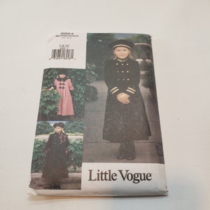 May include: A sewing pattern for a child's coat. The pattern is for sizes 7, 8, 10. The pattern is from Little Vogue and has the number 8864 on it.