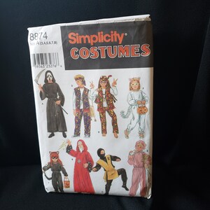 May include: Simplicity Costumes pattern featuring various Halloween costume designs. The package includes illustrations of a Grim Reaper, a hippie, a cat, a wizard, a ninja, and other characters. The pattern size is A (3,4,5,6,7,8).