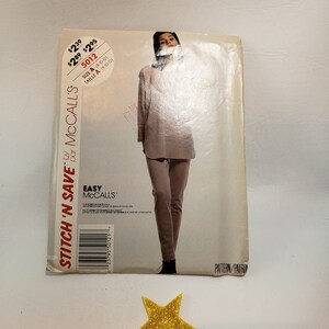 May include: A sewing pattern for a long-sleeved top and pants. The pattern is for sizes 8-10-12 and is from McCall's Stitch 'N Save line. The pattern is priced at $2.39, $2.89, and $2.95.
