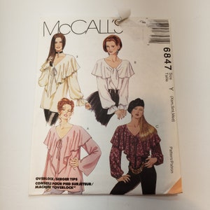 McCall's 6847 sewing pattern for pullover top with large ruffle front options , long bell or elasticized cuff sleeves, UNCUT FF, sz xsm-med image 1