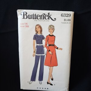 May include: Vintage sewing pattern for a dress and pants. The pattern is from Butterick, number 6329, and is for size 14 with a bust measurement of 36 inches. The pattern is priced at $1.00.