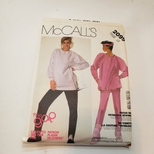 May include: McCall's sewing pattern number 2095 for a women's top and pants. The pattern is for sizes 12. The pattern includes instructions for overlock sewing. The pattern is for the Gap.