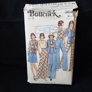 May include: A vintage sewing pattern envelope for a women's clothing pattern. The pattern is from Butterick, size 12, and is for a pantsuit with a plaid skirt and a sleeveless top. The pattern is from S.K.-O-Lina LTD. Southgate Branch, Edmonton.