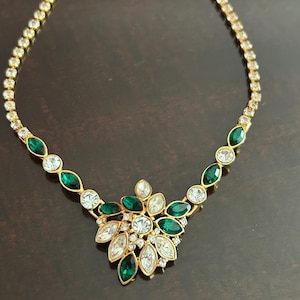 Stunning Monet vintage gold plated rhinestone choker necklace. Signed.