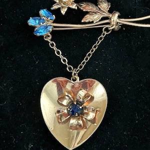 Rare vintage Corocraft sterling flower and heart brooch with blue crystals. Signed pin.