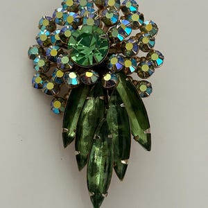 Vintage Judy Lee layered pineapple brooch-pendant prong set with green & aurora borealis rhinestones. Signed pin.