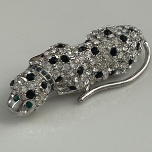Vintage KJL rhinestone leopard brooch. Signed KJL for Avon.