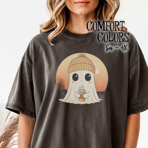 Coffee Ghost Wearing Beanie Holding Steaming Cup of Joe Autumn Sunset Comfort Colors Tee