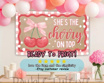 May include: A party banner with the text "She's the cherry on top" and a cherry illustration. The banner is framed with a pink and white gingham pattern and has the words "Ready to Print!" at the bottom. Pink and white balloons are in the background.